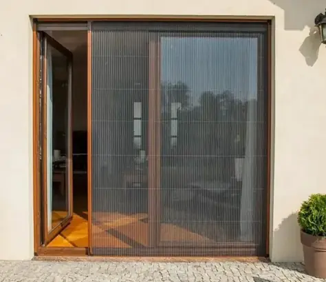 Pleated mosquito net door installed at a Chennai home entrance