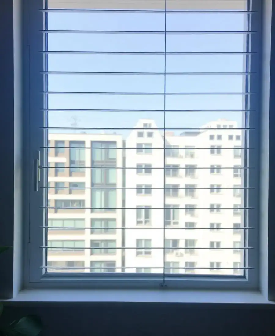 Window invisible grill in Chennai keeping a clear outside view